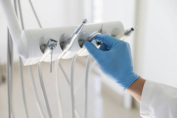 Professional Emergency Dentist technician working in Luce County County, MI